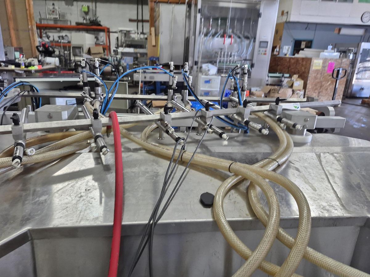 Used Aesus AESFill AF6 Fully Automatic 6-Head Liquid Filling Machine