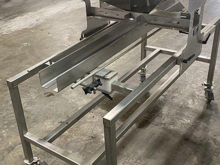 Used Lakewood Manual Clamshell Filler