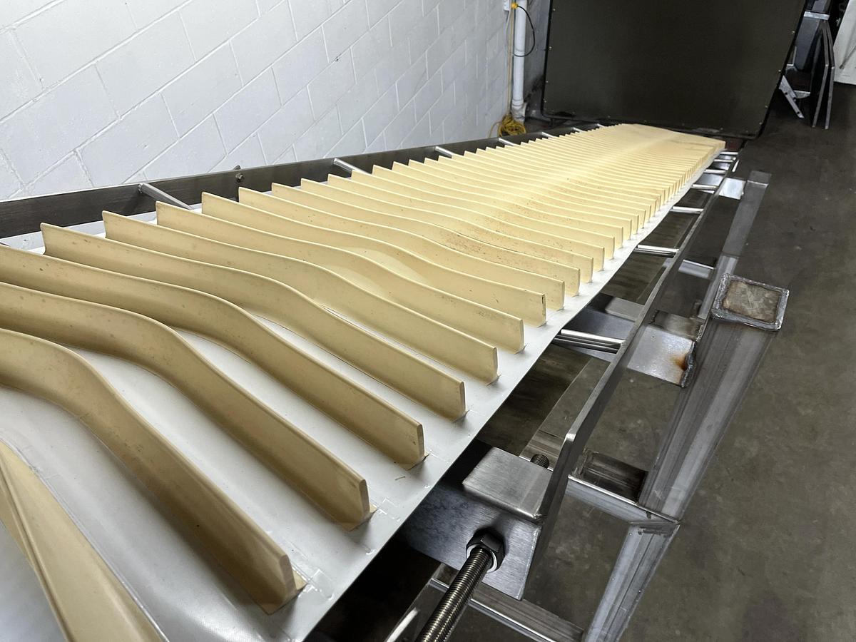 Used Interroll 18'L Cleated Incline Conveyor