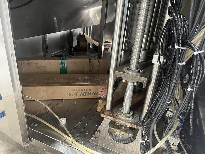 Used 6-Head Bottle Filler