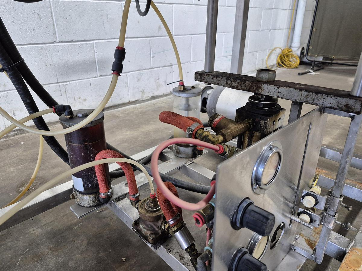 Used All-Fill Automatic Inline Single-Head Bottle Filler with Conveyor