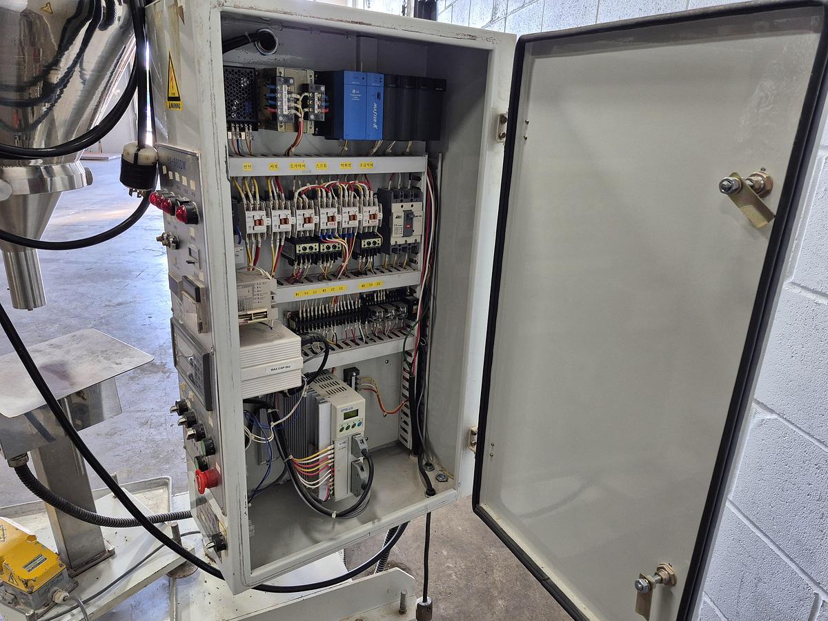 Used Hansaem HA-980 DW Powder Filler