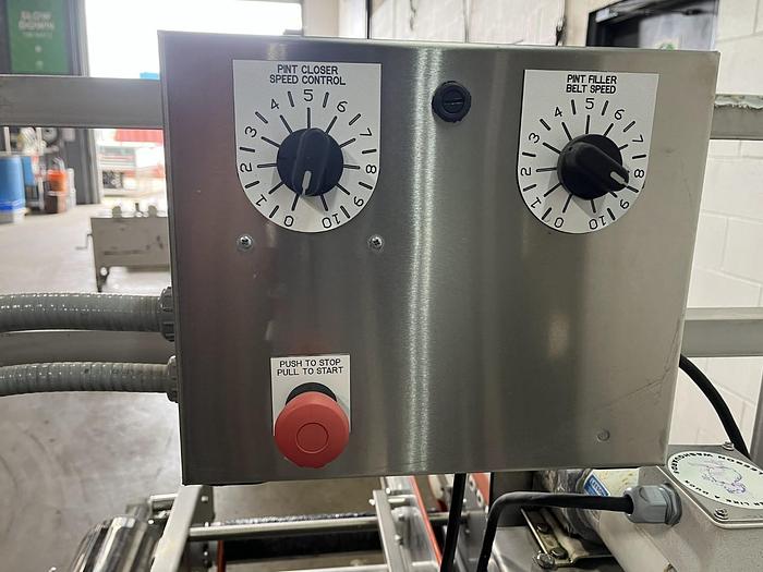 Used Lakewood 31025 Volumetric Clamshell Filler