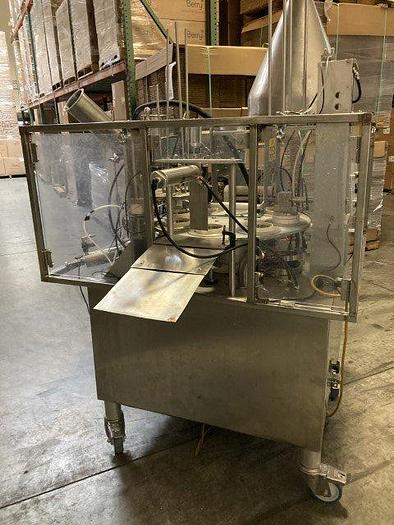 Used World Cup Rotary Filler