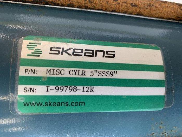 Used Pneumatic Press on Chain Conveyor