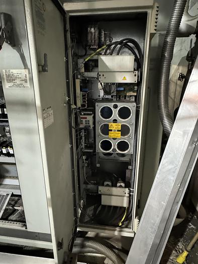 Used UNILOY R2000 BLOWMOLDER WITH 10041 TRIMMER AND COOLING BED 