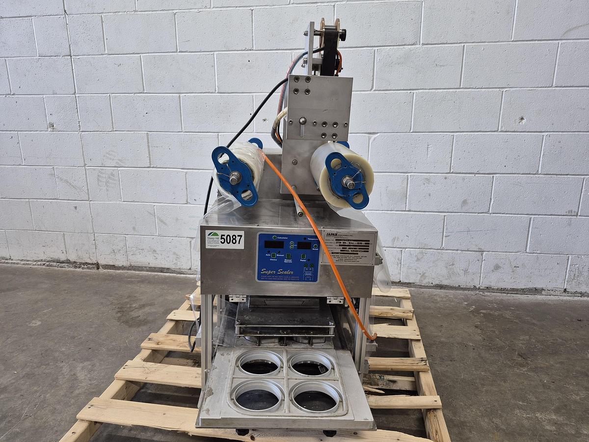 Used Japak KE TO-900 Automatic Cup & Tray Sealer