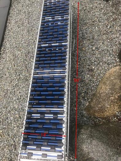 Used UNEX 8 ft Food-Grade Hex Hub Wheel Bed Conveyors