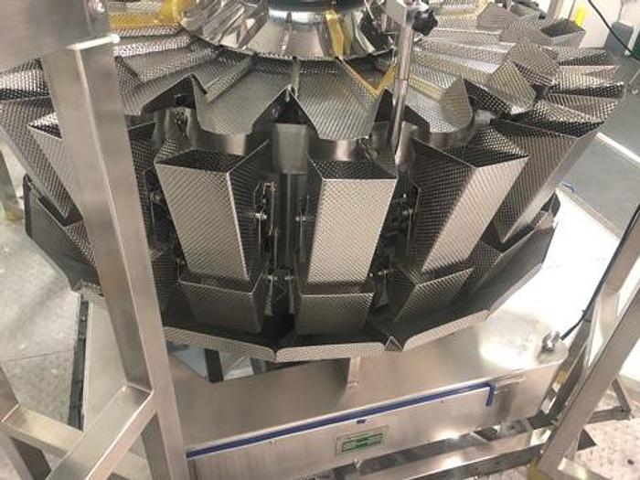 Used Actionpac Rotary Poucher with Scales