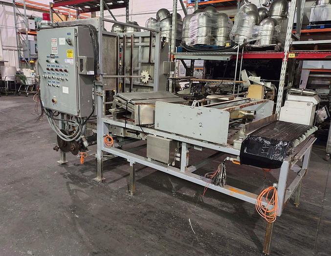 Used Adamatic NDR Roll Make-Up Line