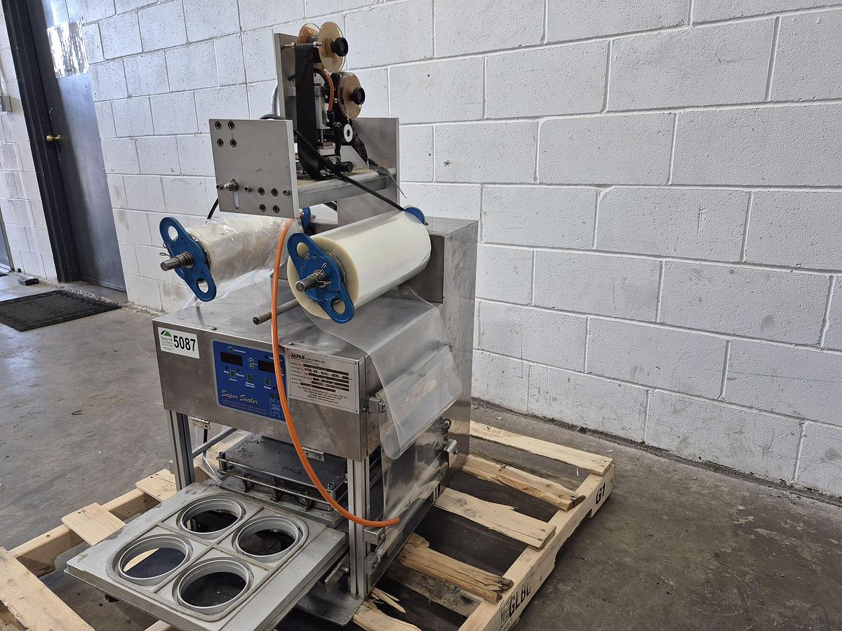 Used Japak KE TO-900 Automatic Cup & Tray Sealer