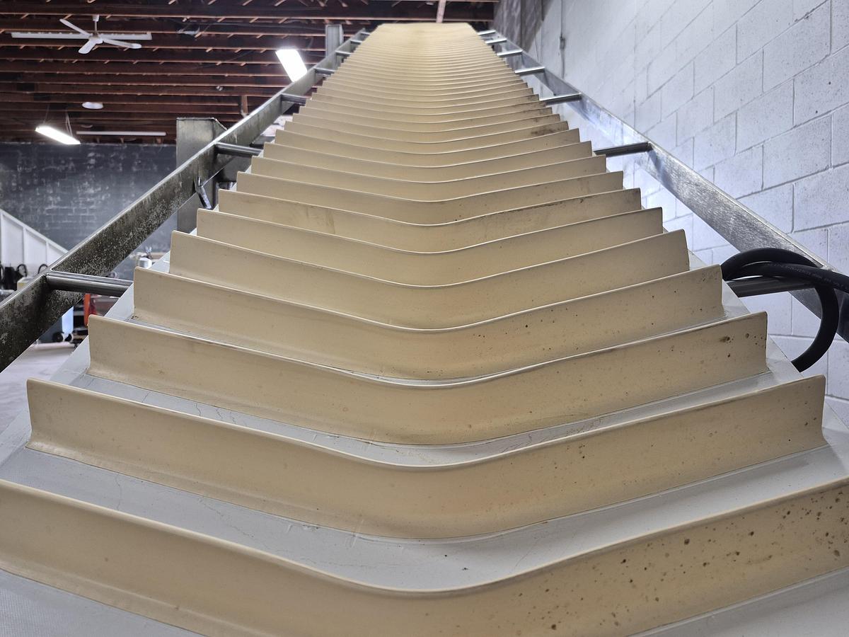 Used Interroll 18'L Cleated Incline Conveyor