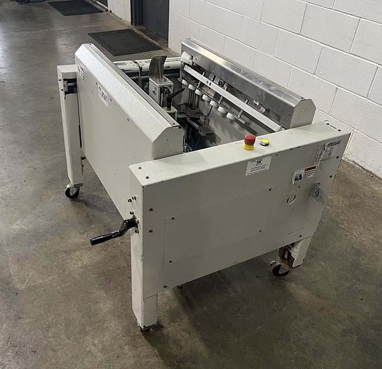 Used Interpack™ UPF 2420 Uniform Pneumatic Flap Folder