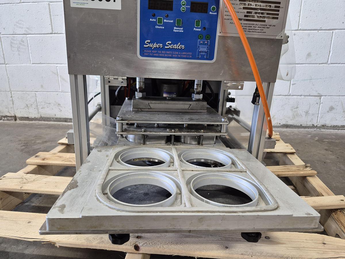 Used Japak KE TO-900 Automatic Cup & Tray Sealer