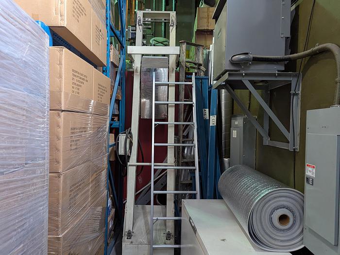 Used Two-Head Vibratory Filler with Elevator