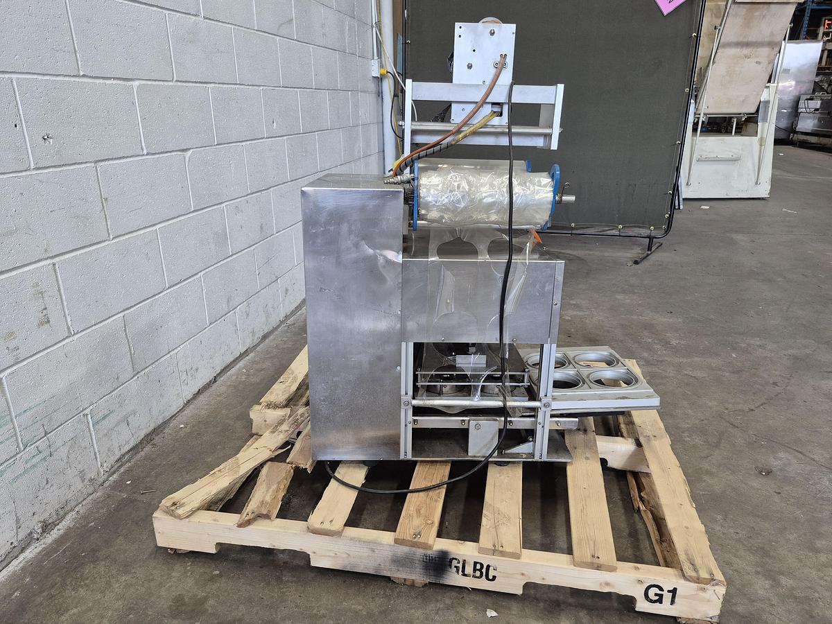 Used Japak KE TO-900 Automatic Cup & Tray Sealer