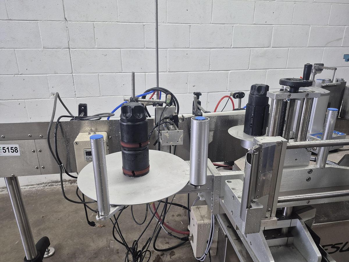 Used Aesus Eco Wrap Prism Labelling Machine