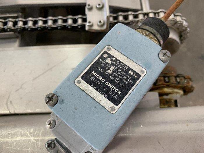 Used Pneumatic Press on Chain Conveyor