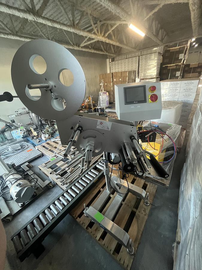 Used Accutek Tamper Evident Neck Bander Applicator