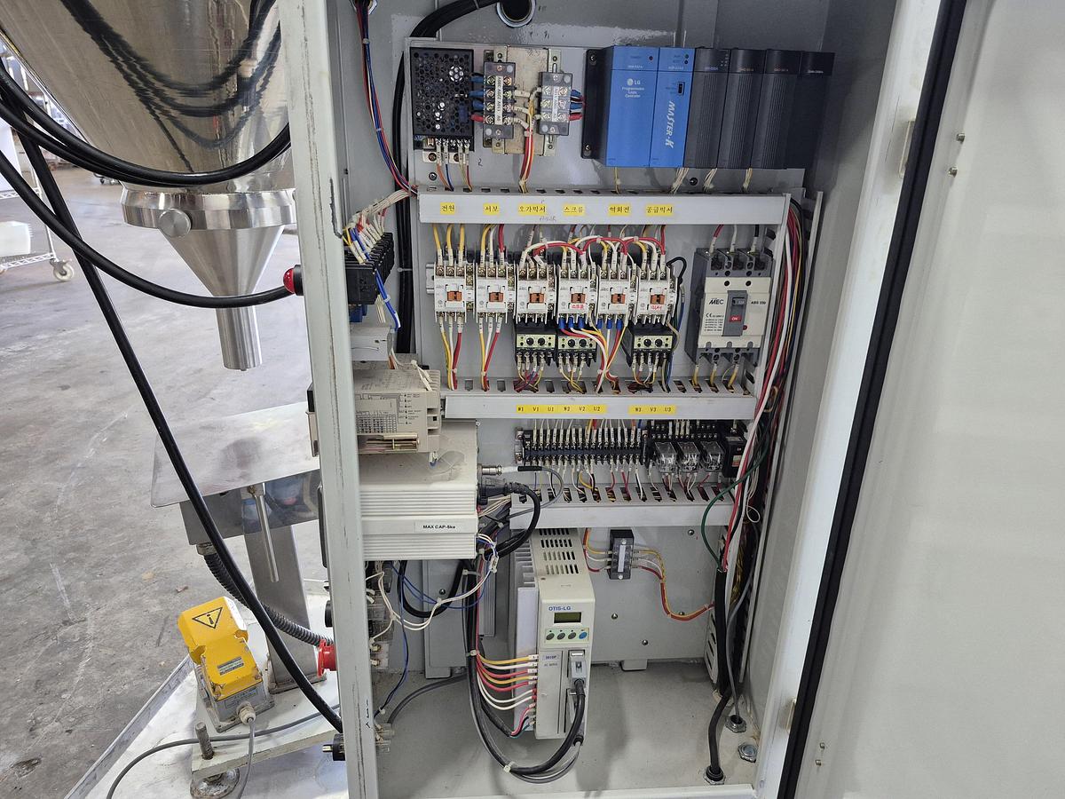 Used Hansaem HA-980 DW Powder Filler