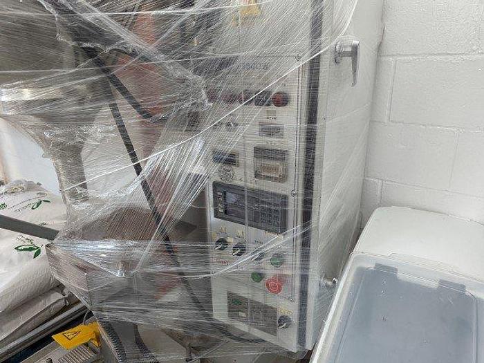 Used Hansaem HA-980 DW Powder Filler