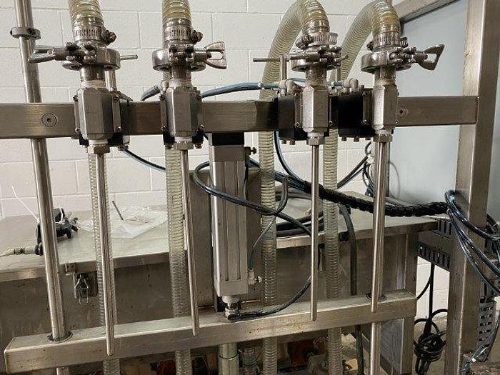 Used APS 4-Head Pump Filler