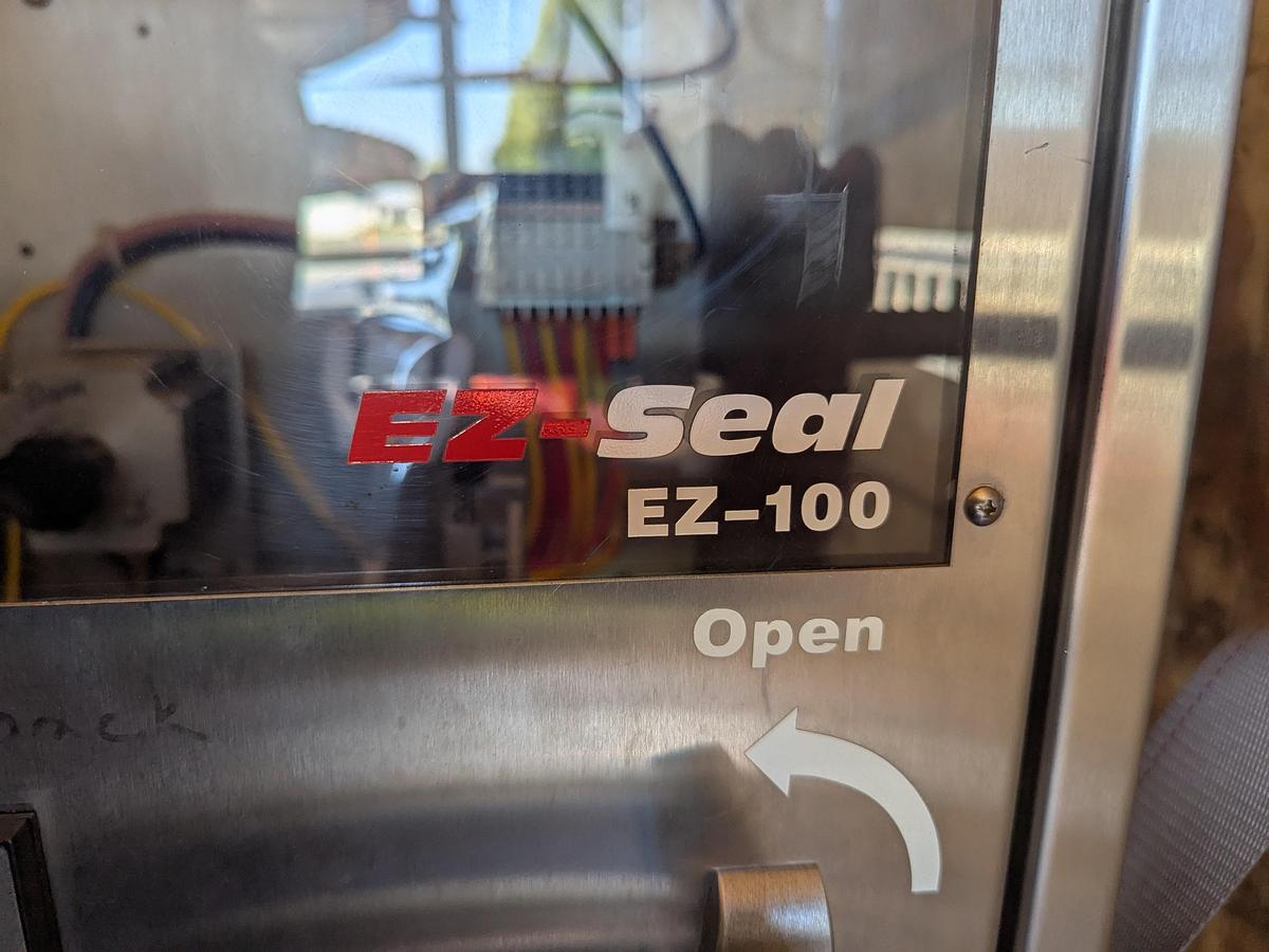 Used Axxon Shrink Sleeve Applicator and Shrink Tunnel