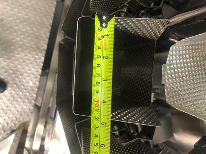 Used Actionpac Rotary Poucher with Scales