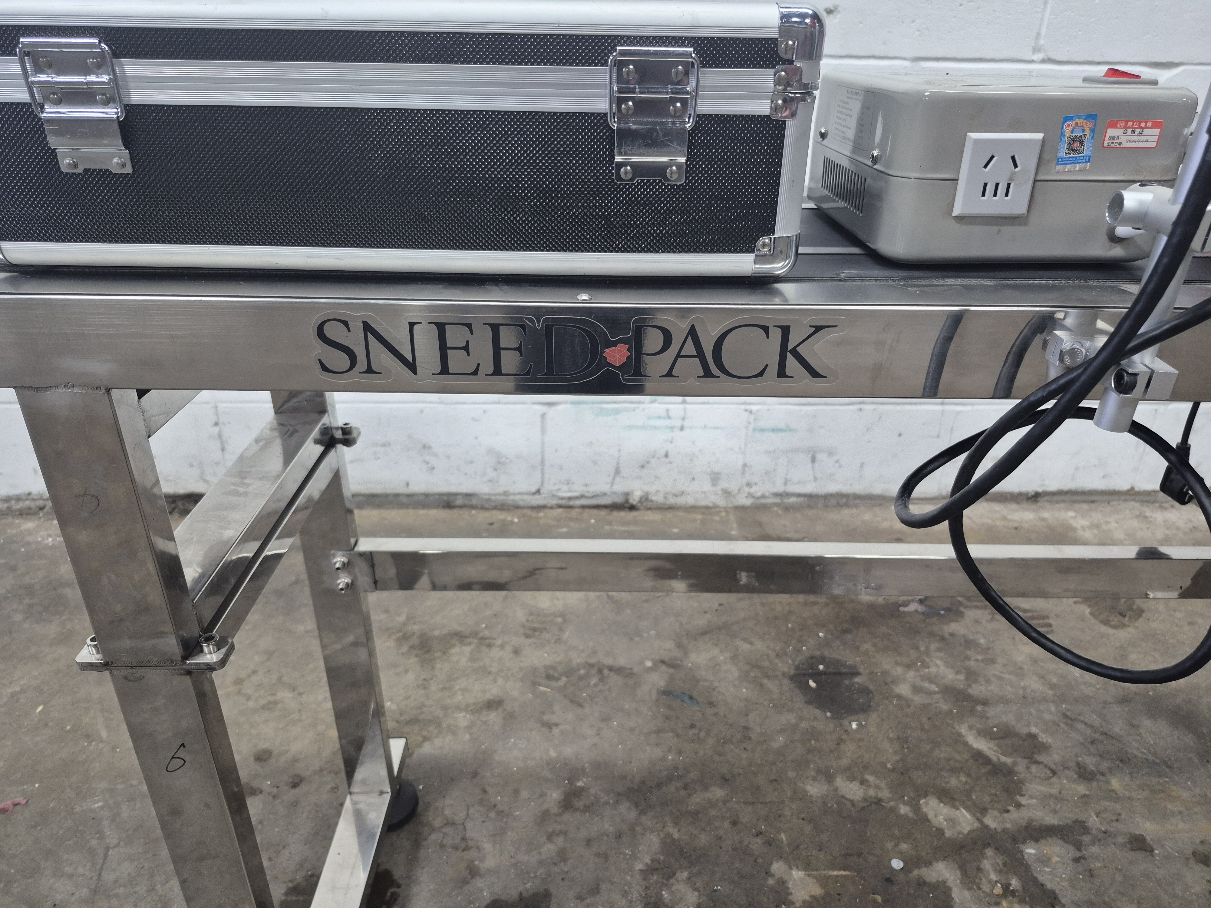 Used Sneed-Pack 5ft Conveyor