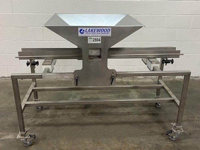 Used Lakewood Manual Clamshell Filler