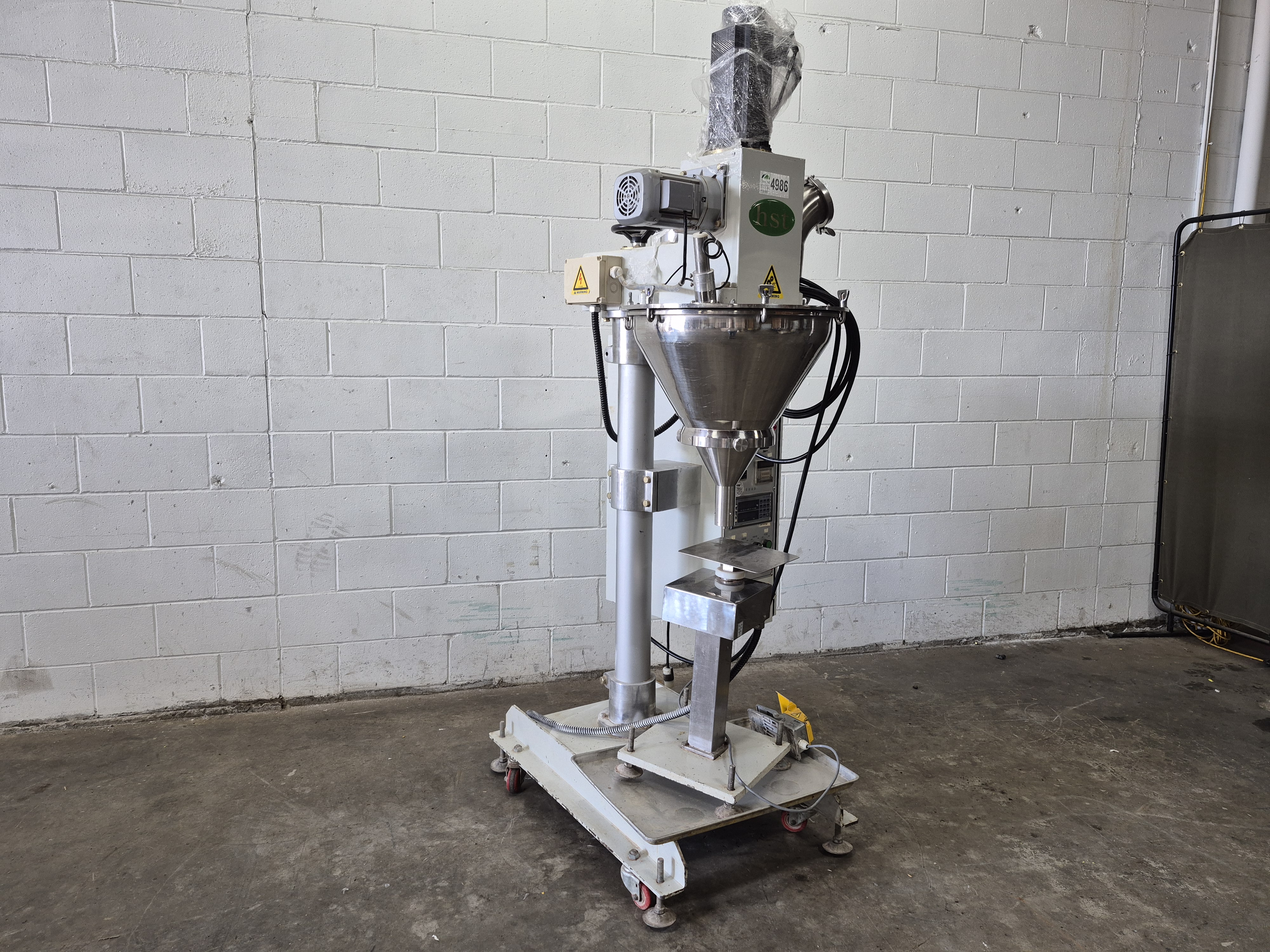 Used Hansaem HA-980 DW Powder Filler