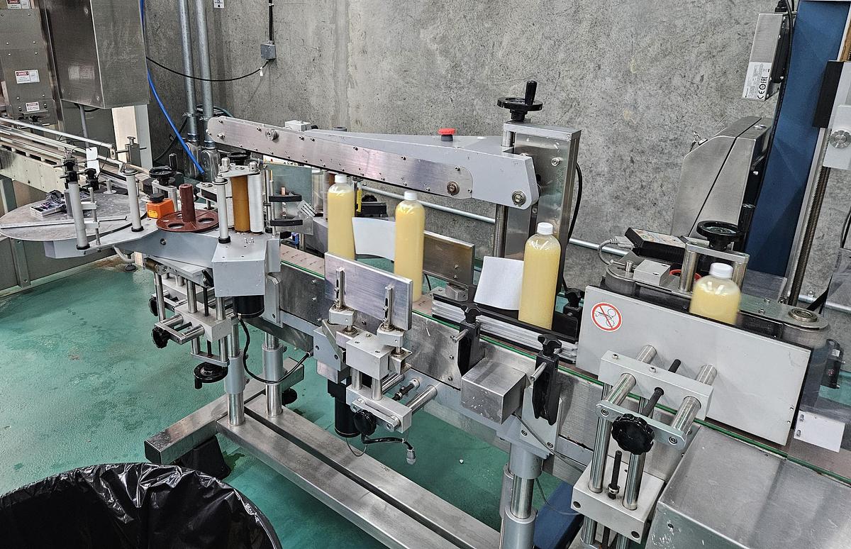 Used Acasi 12 Head Bottling Line with Capper and Labeler