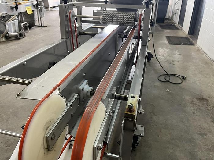 Used Lakewood 31025 Volumetric Clamshell Filler