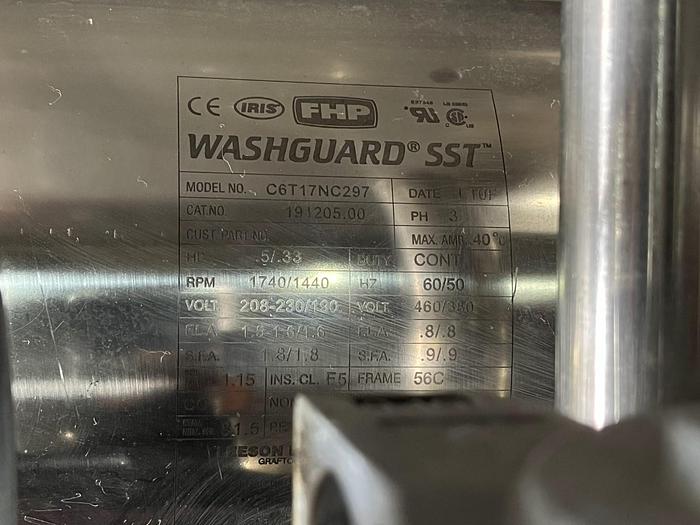 Used Lakewood 31025 Volumetric Clamshell Filler