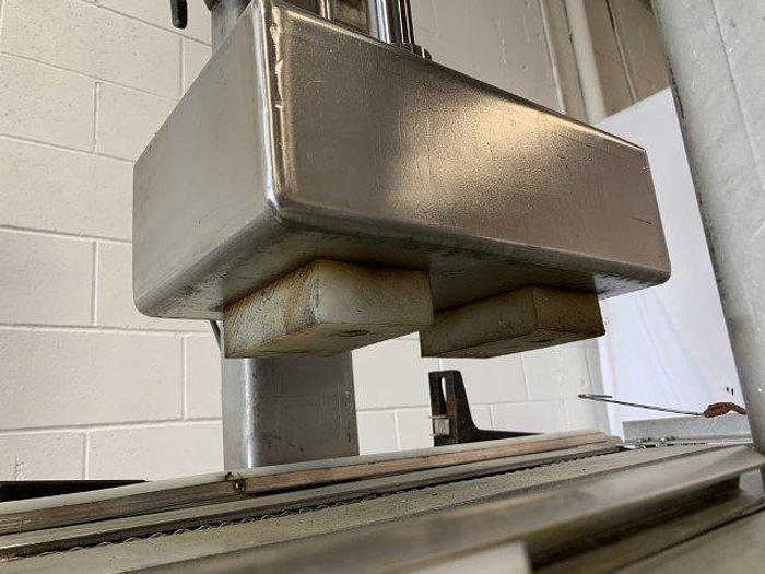 Used Pneumatic Press on Chain Conveyor