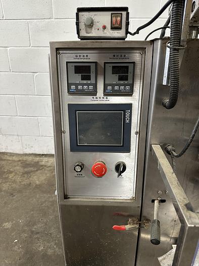 Used Vertical Form Fill Sachet Machine with Auger Filler