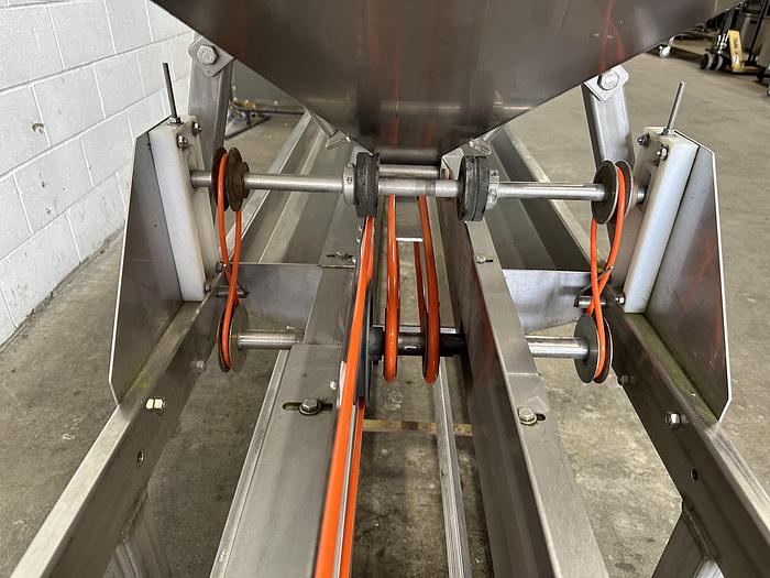 Used A&B Volumetric Clamshell Filler