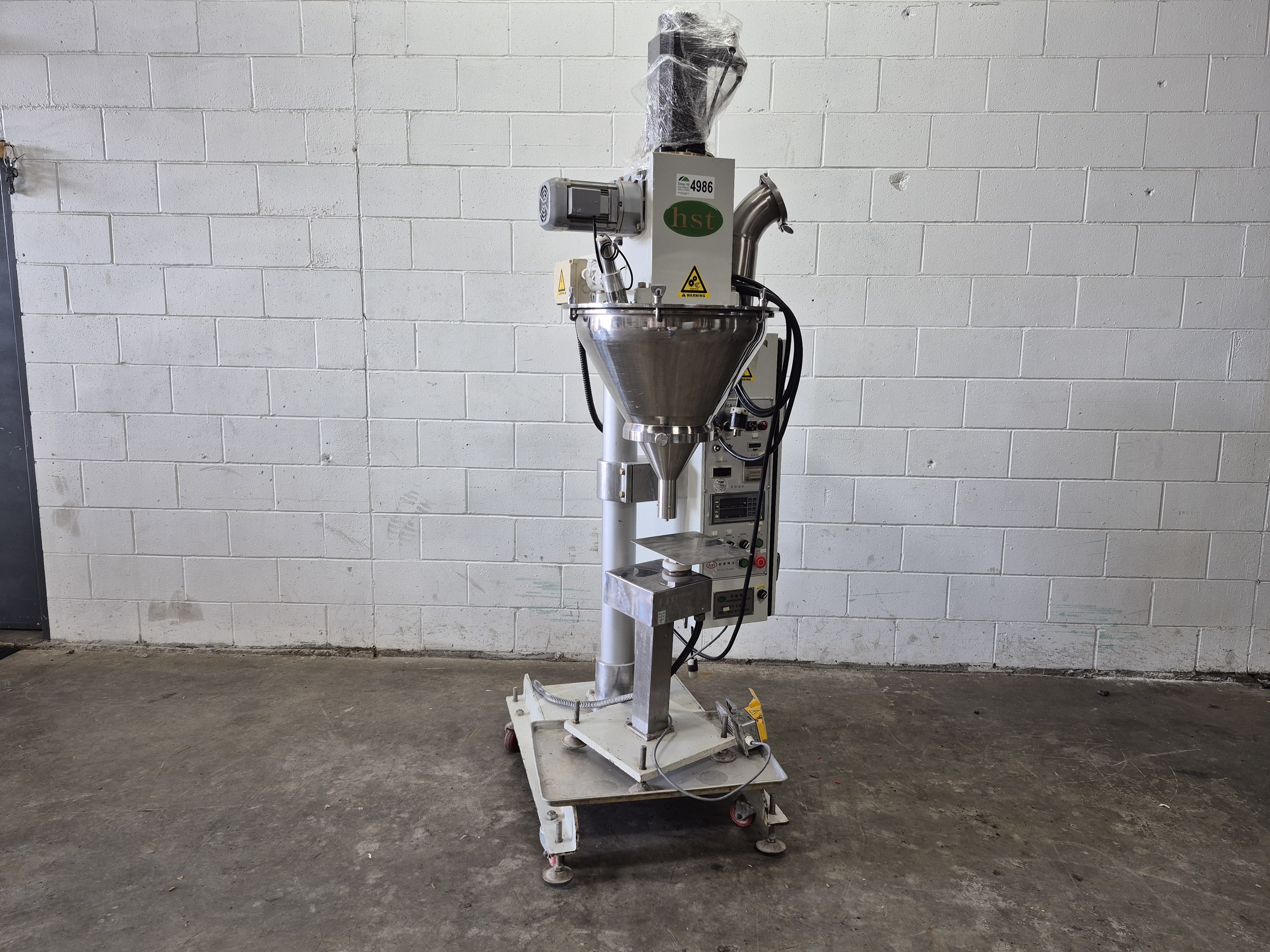 Used Hansaem HA-980 DW Powder Filler