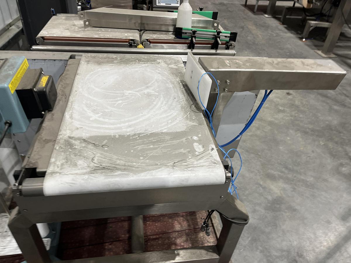 Used Ram Reject Conveyor