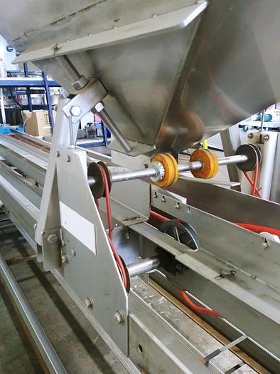 Used A&B Volumetric Clamshell Filler