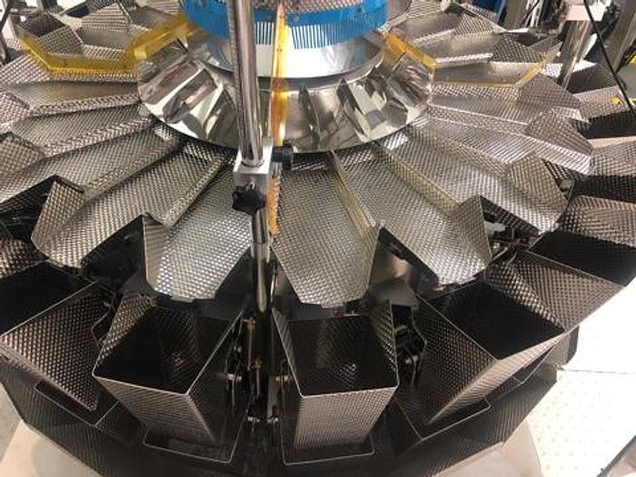 Used Actionpac Rotary Poucher with Scales