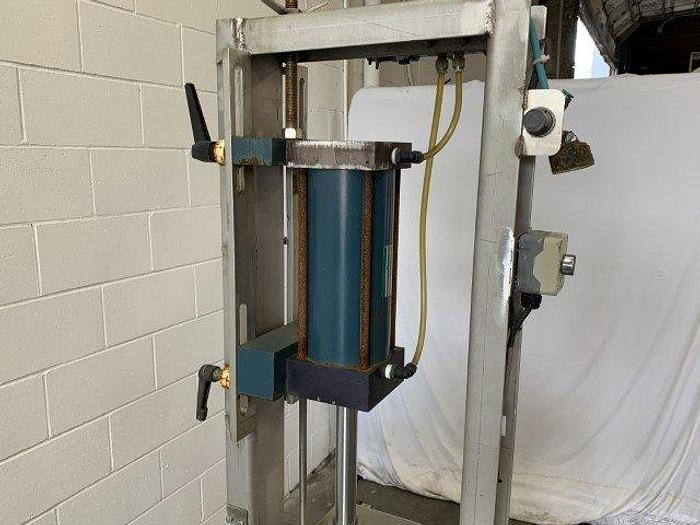 Used Pneumatic Press on Chain Conveyor