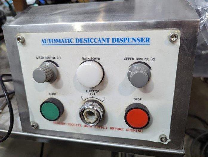 Used Lattine LSM50 Desiccant Dispenser