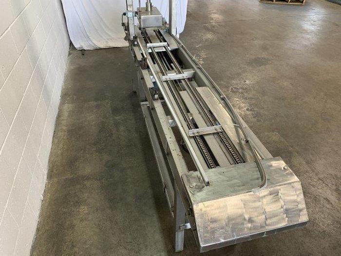 Used Pneumatic Press on Chain Conveyor