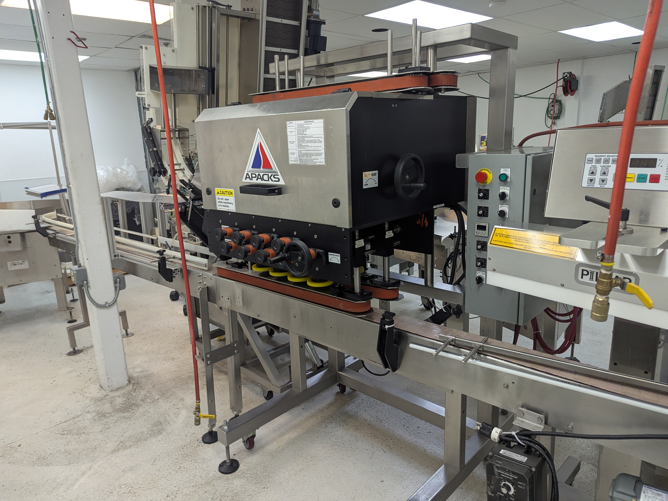 Used Apacks Spindle Capper and Cap Elevator