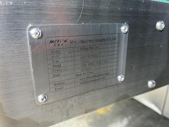 Used 6-Head Bottle Filler