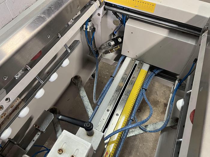 Used Interpack™ UPF 2420 Uniform Pneumatic Flap Folder