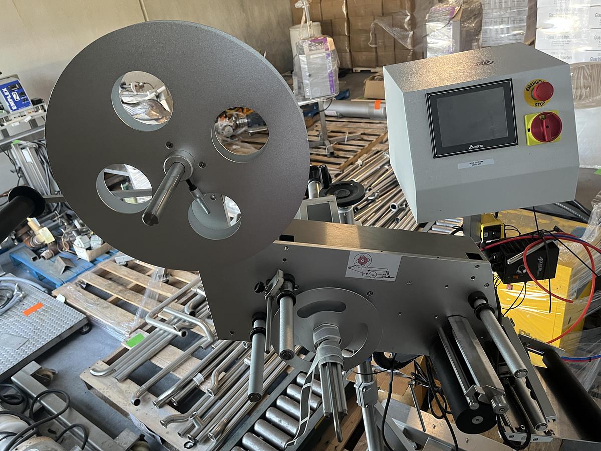 Used Accutek Tamper Evident Neck Bander Applicator