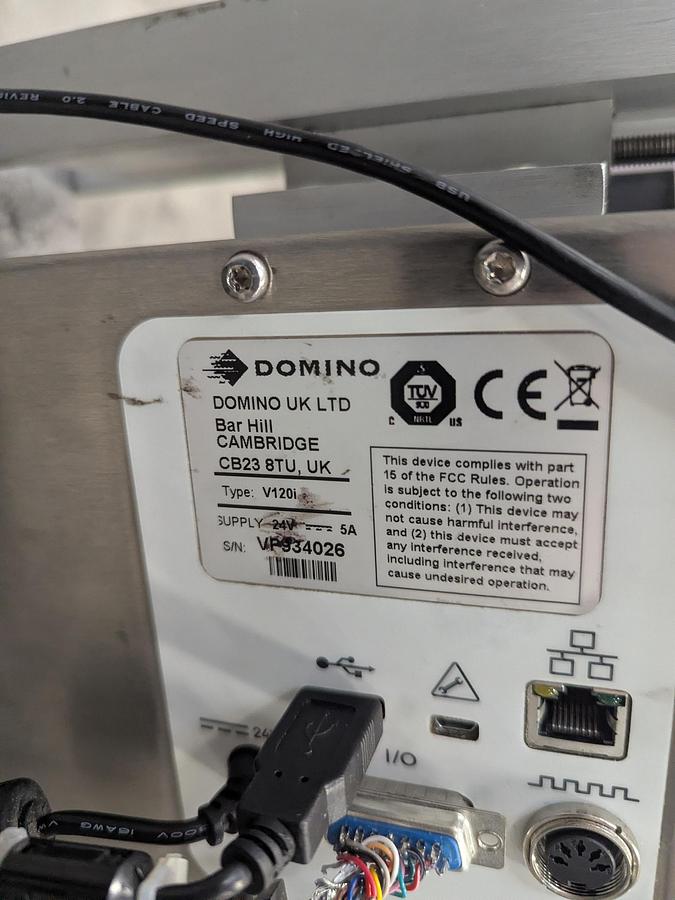 Used Aesus 6-Head Filling Line with Descrambler. Labeler, Filler, Capper, Induction Sealer & Accumulation Table