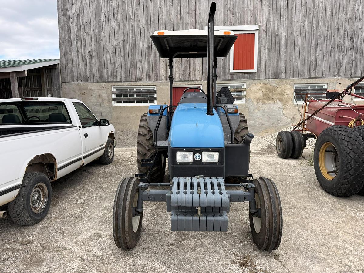 Used 1999 New Holland TL70, 65 hp 2WD Open Station Tractor